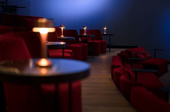 a lamp on a table in the harbour stage